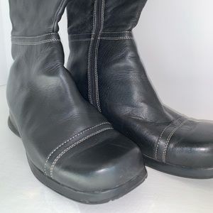 Women’s black leather zippered boots